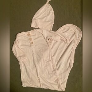 Newborn take home outfit with hat.